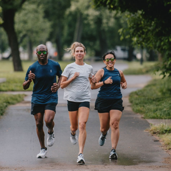 Three people running