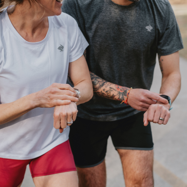 two runners wearing garmin