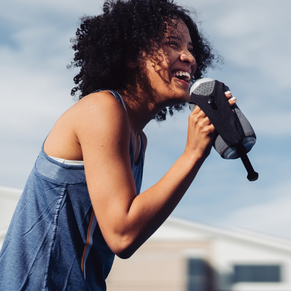 Woman holding a water bottle