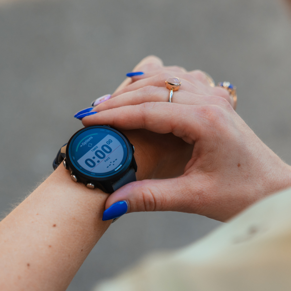 Woman wearing a Garmin watch