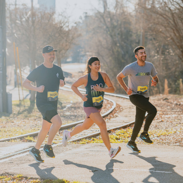 Three People Running In a Race