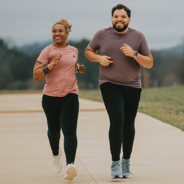 Man and woman running together