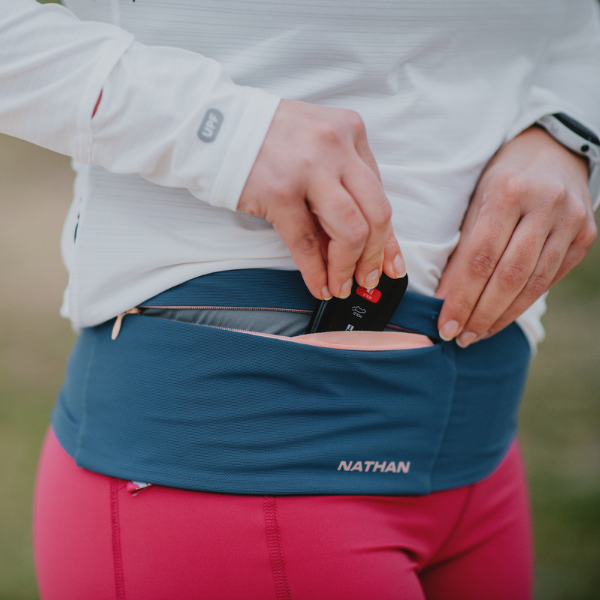 Woman wearing a Nathan belt