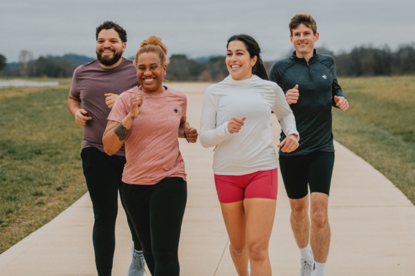 Group of people running together